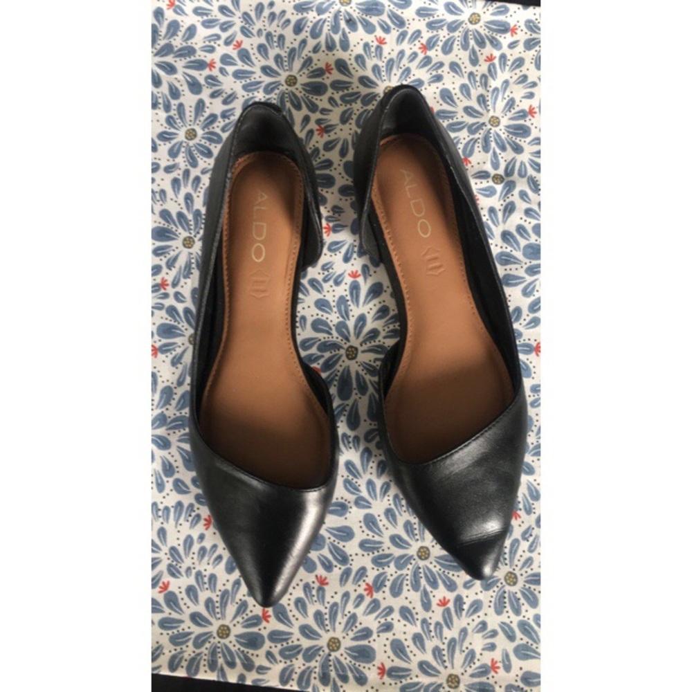 Black leather flats